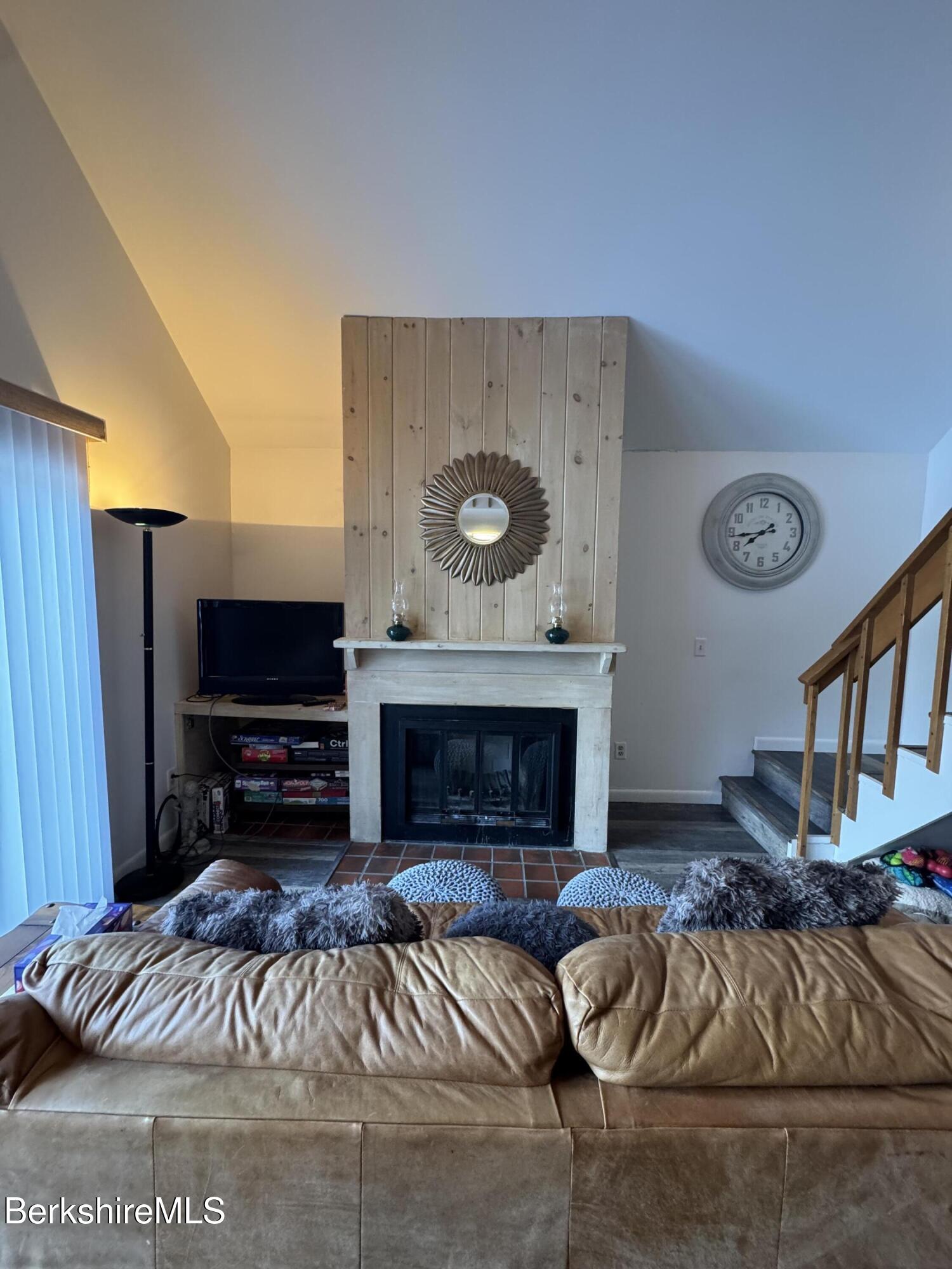 37 Corey Road, Unit 14 Hancock, MA 01237 - Photo 16 of 30 a living room with furniture and a fireplace