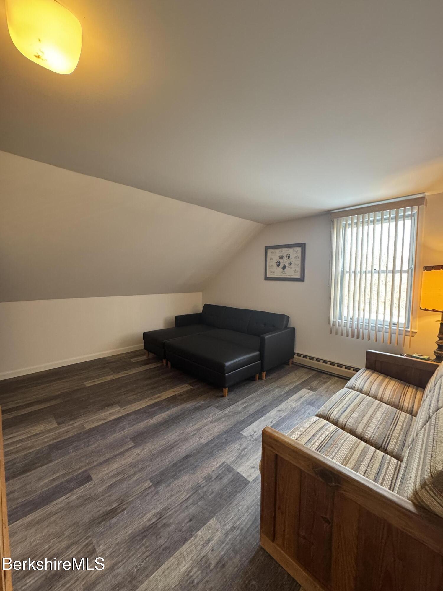 37 Corey Road, Unit 14 Hancock, MA 01237 - Photo 22 of 30 a bedroom with furniture and a window