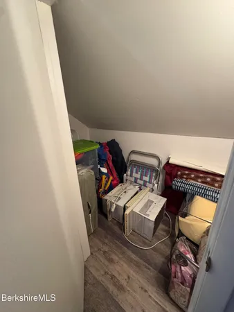 a utility room with two washing machine