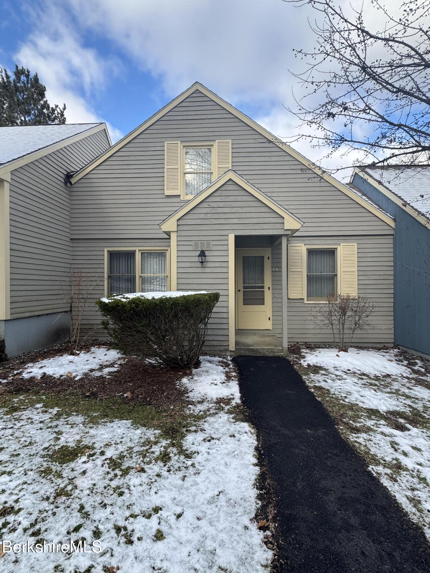 37 Corey Road, Unit 14 Hancock, MA 01237 - Photo 4 of 30 a front view of a house with a yard