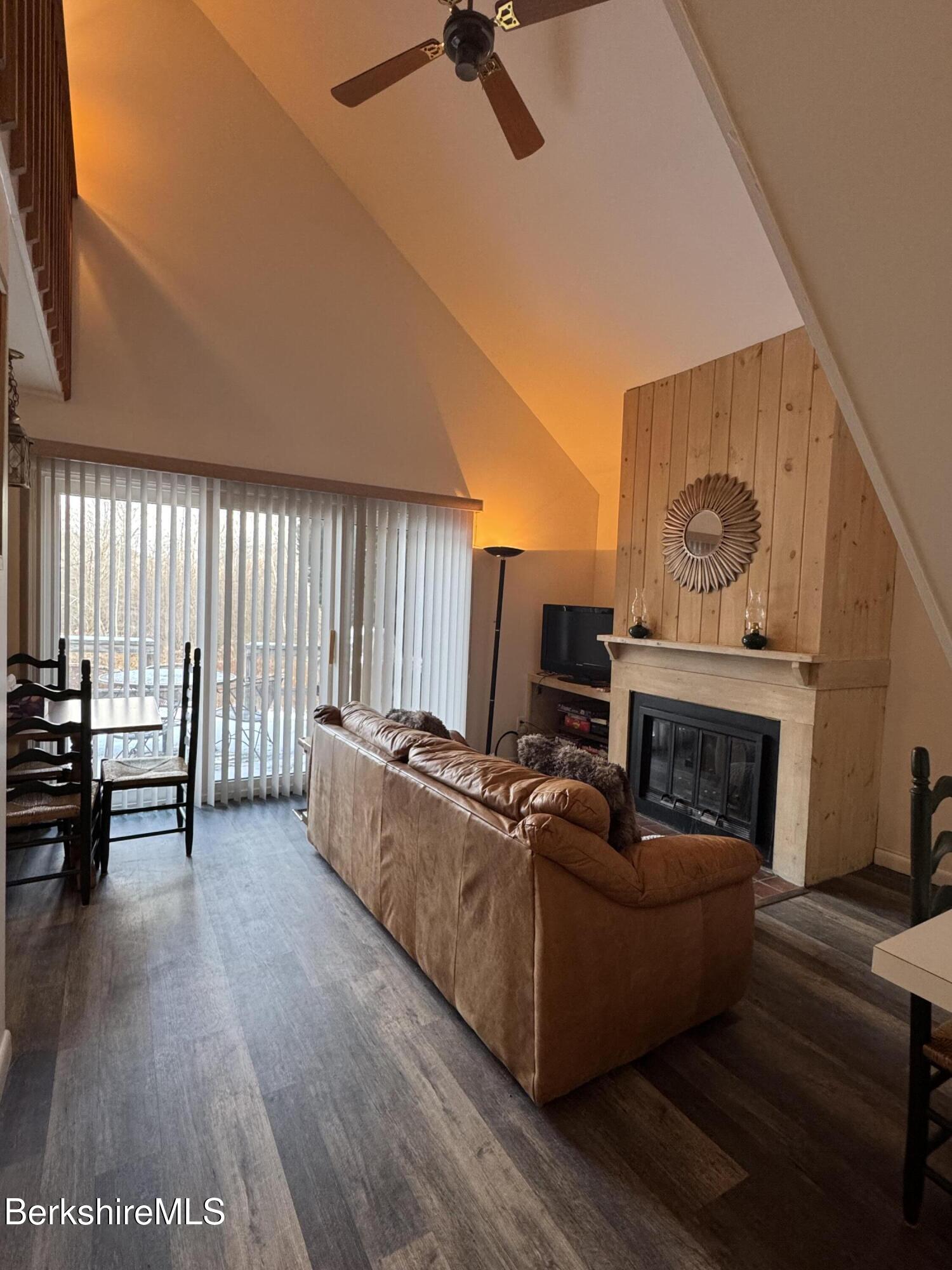 37 Corey Road, Unit 14 Hancock, MA 01237 - Photo 7 of 30 a living room with furniture and a fireplace