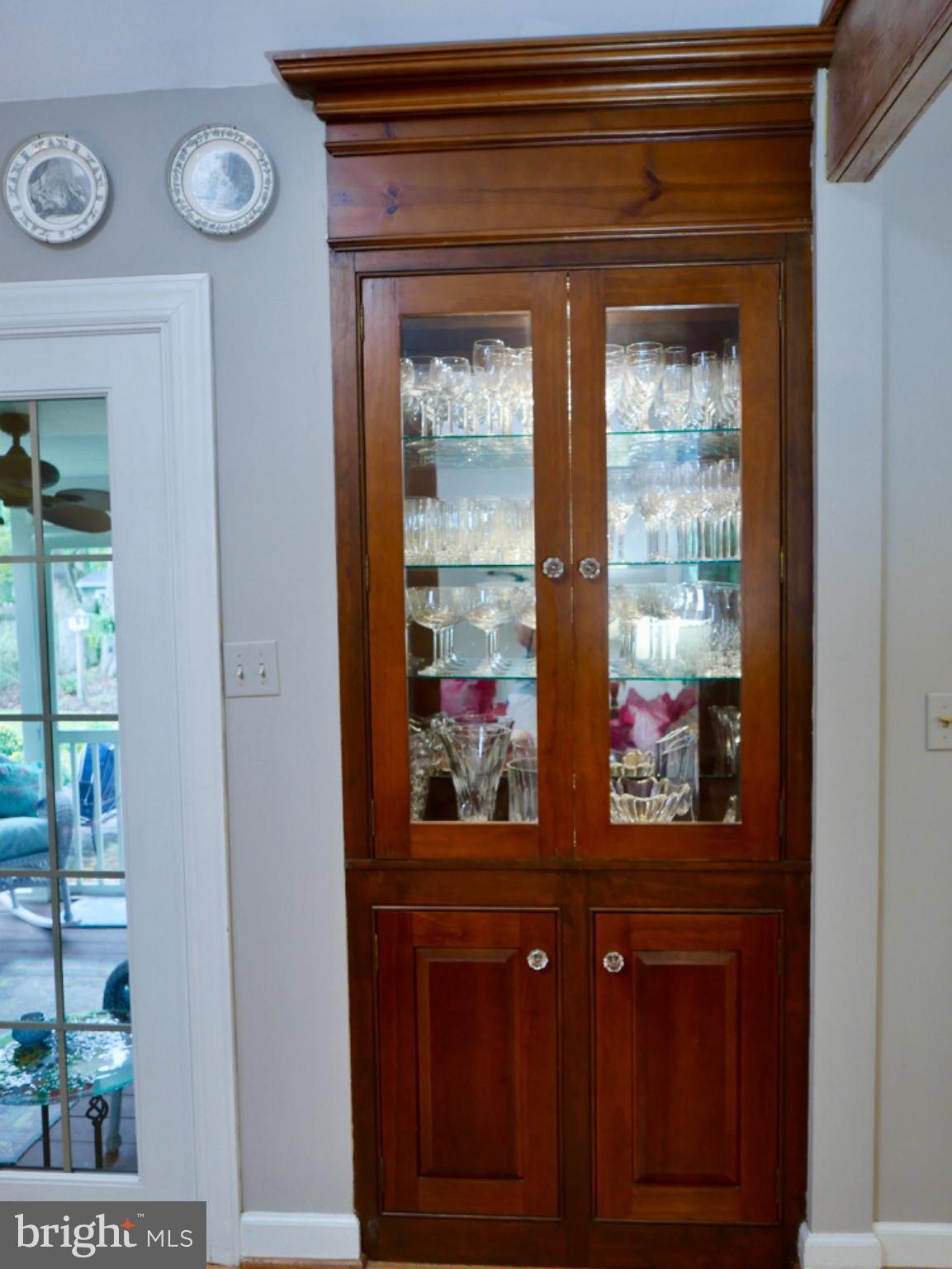 700 South Talbot Street St. Michaels, MD 21663 - Photo 22 of 83 Built-in, lighted glass display cabinet w/storage