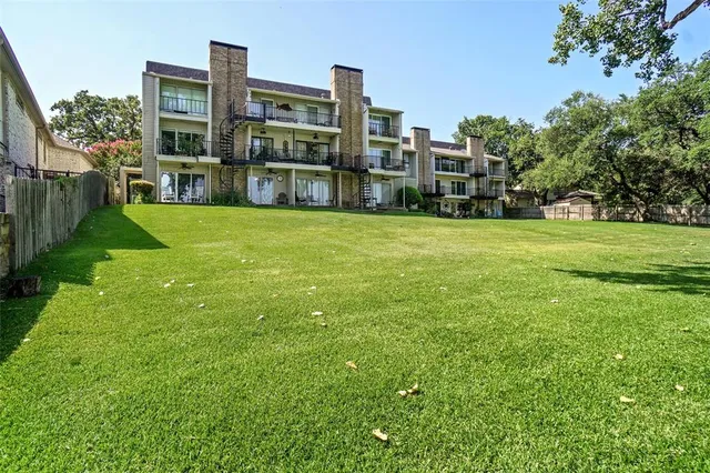 a view of a lake with a garden