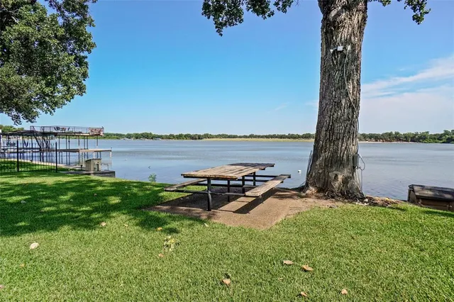 a view of a lake with a outdoor space