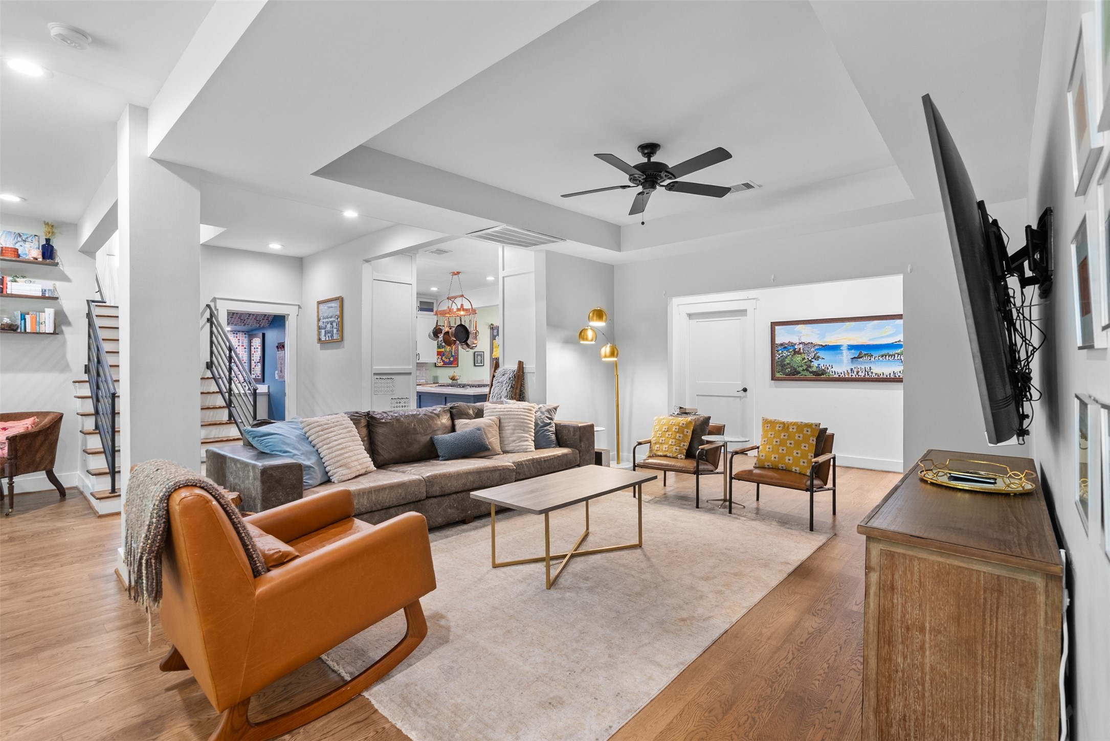 4503 McKinney Street Houston, TX 77023 - Photo 12 of 37 a living room with furniture a flat screen tv and a table