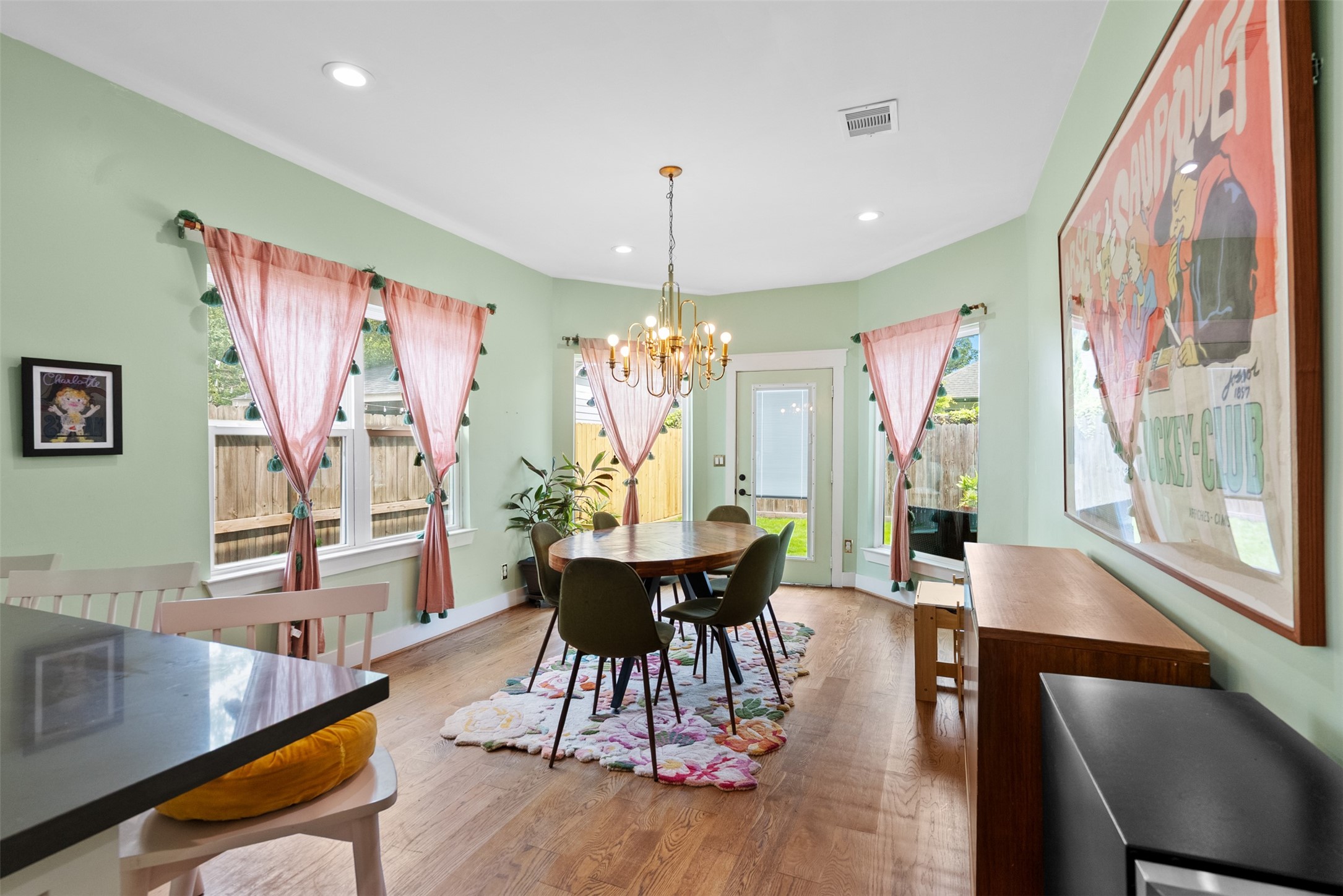 4503 McKinney Street Houston, TX 77023 - Photo 14 of 37 a view of a dining room with furniture window and wooden floor