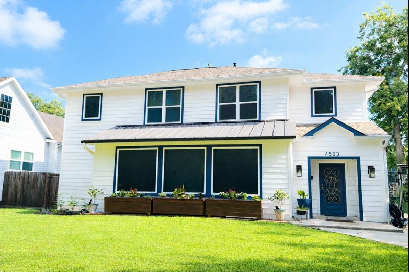 4503 McKinney Street Houston, TX 77023 - Photo 2 of 37 a view of a house with a yard and plants
