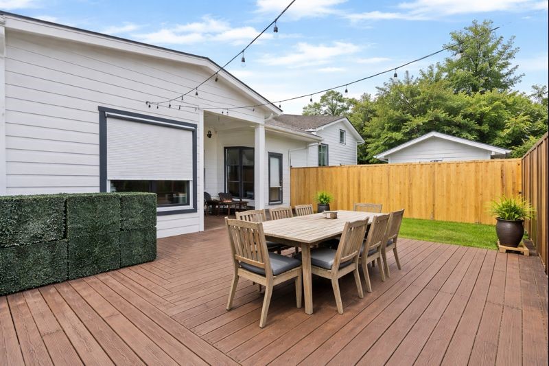 4503 McKinney Street Houston, TX 77023 - Photo 32 of 37 a view of a house with a patio and a yard