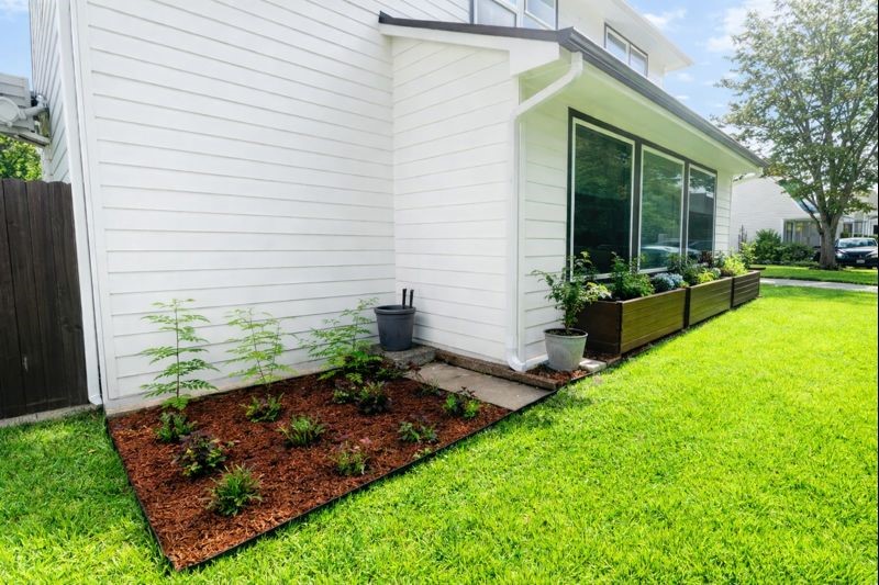 4503 McKinney Street Houston, TX 77023 - Photo 33 of 37 a view of a backyard with plants and patio