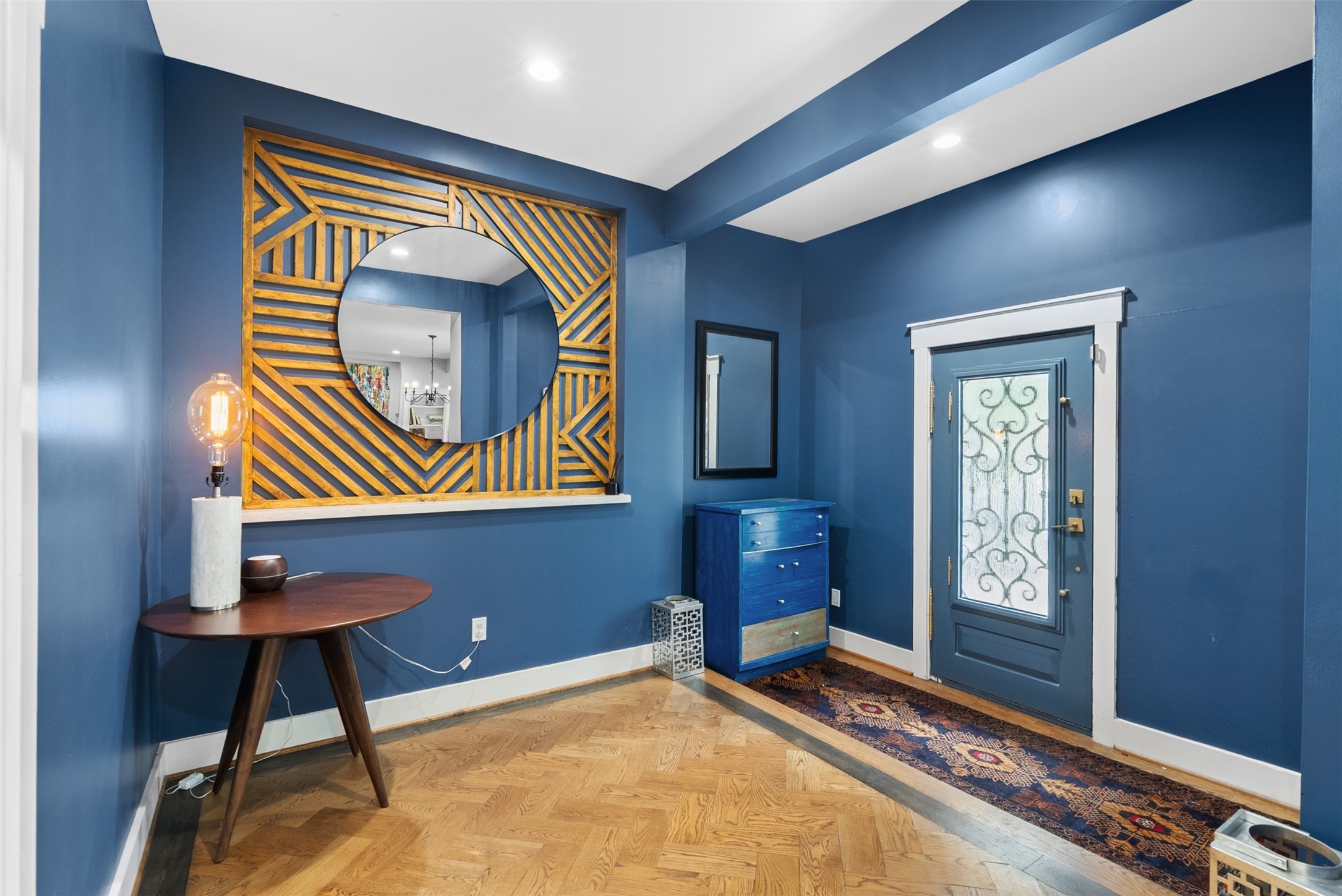 4503 McKinney Street Houston, TX 77023 - Photo 5 of 37 a bedroom with a bed and a painting on the wall