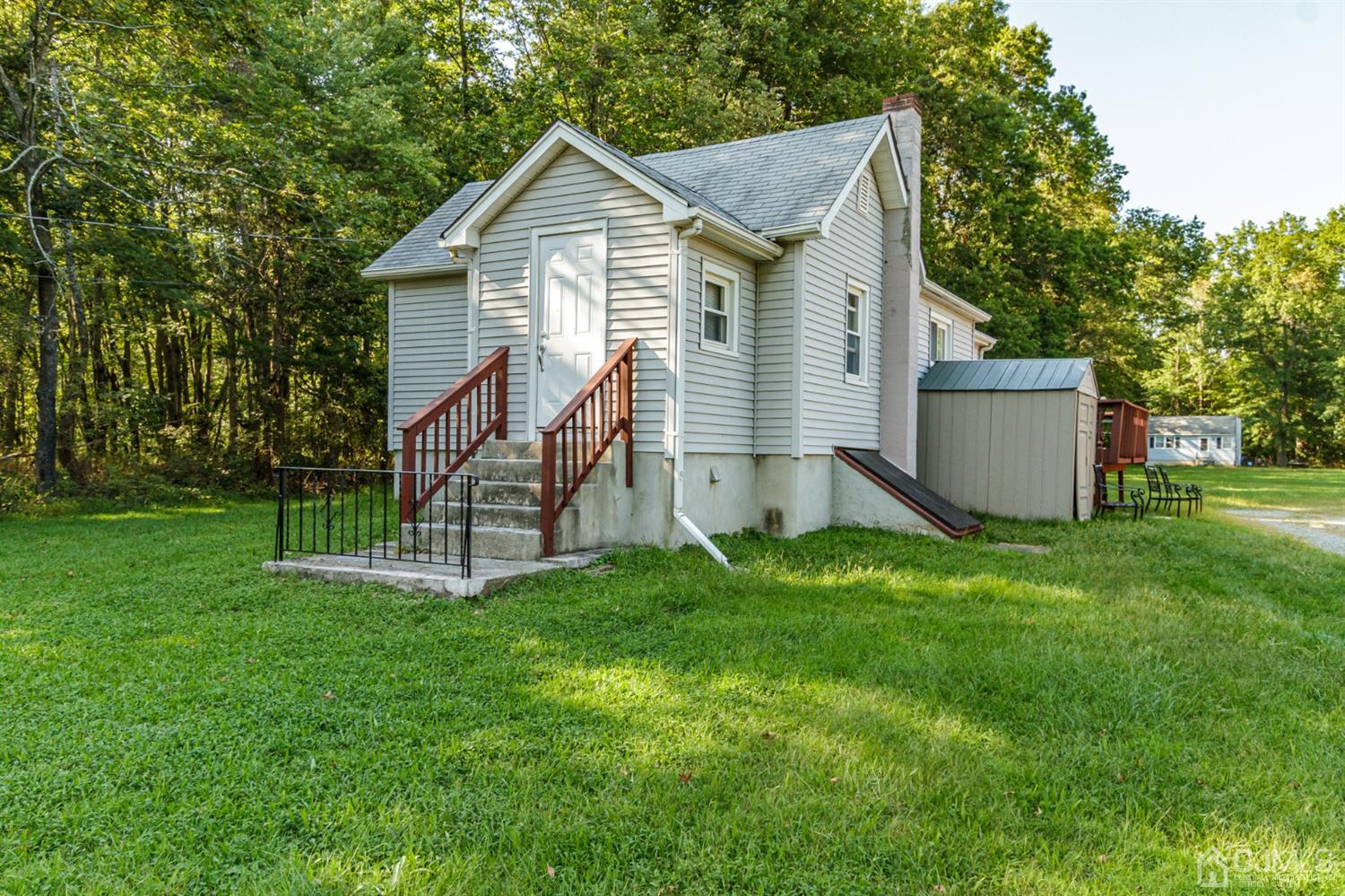 104 Oak Grove Road Flemington, NJ 08822 - Photo 1 of 25 a view of a house with a yard and sitting area