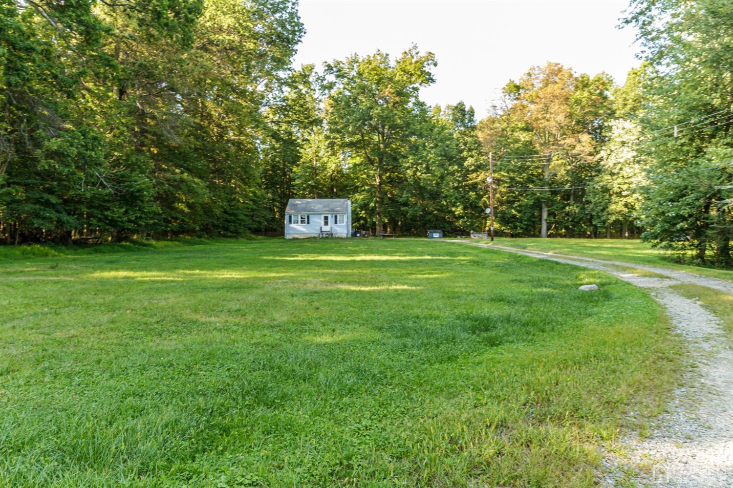 104 Oak Grove Road Flemington, NJ 08822 - Photo 11 of 25 a big yard with trees