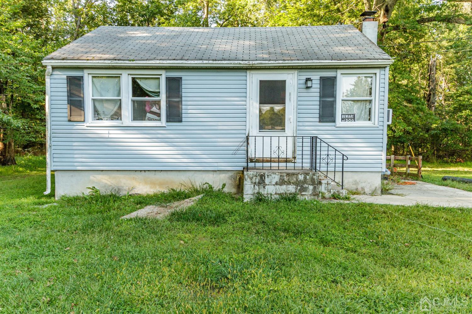 104 Oak Grove Road Flemington, NJ 08822 - Photo 12 of 25 a front view of a house with a yard