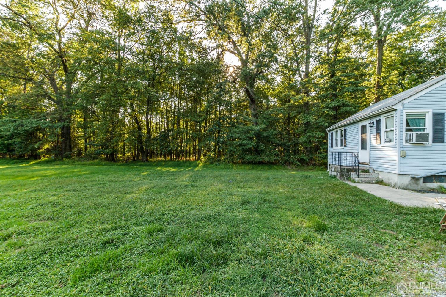 104 Oak Grove Road Flemington, NJ 08822 - Photo 20 of 25 a view of house with backyard