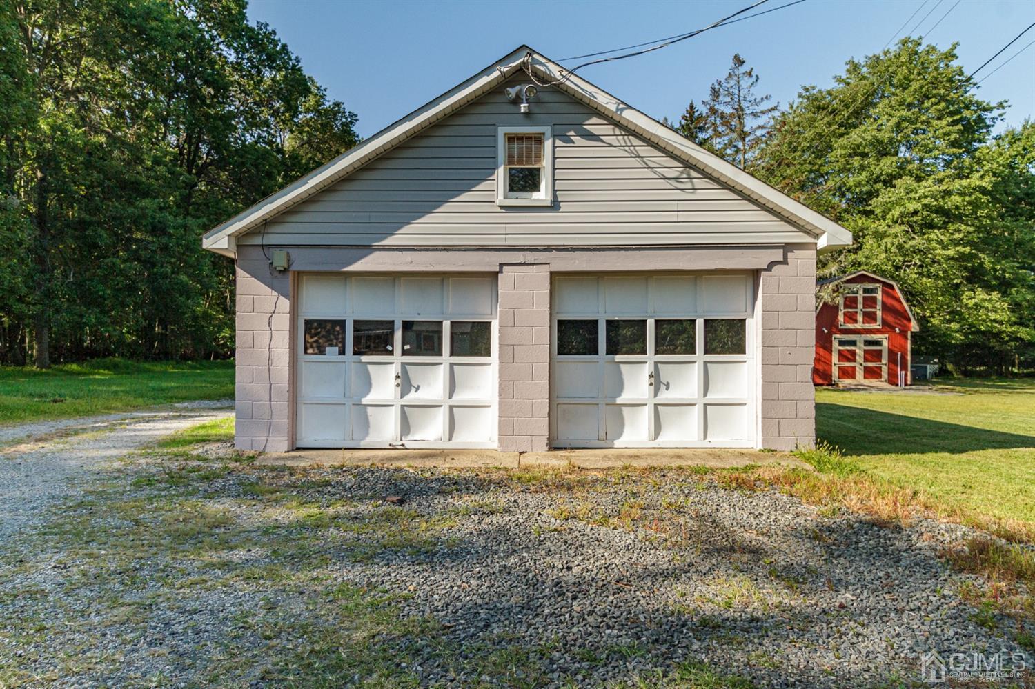 104 Oak Grove Road Flemington, NJ 08822 - Photo 22 of 25 a front view of a house with a yard