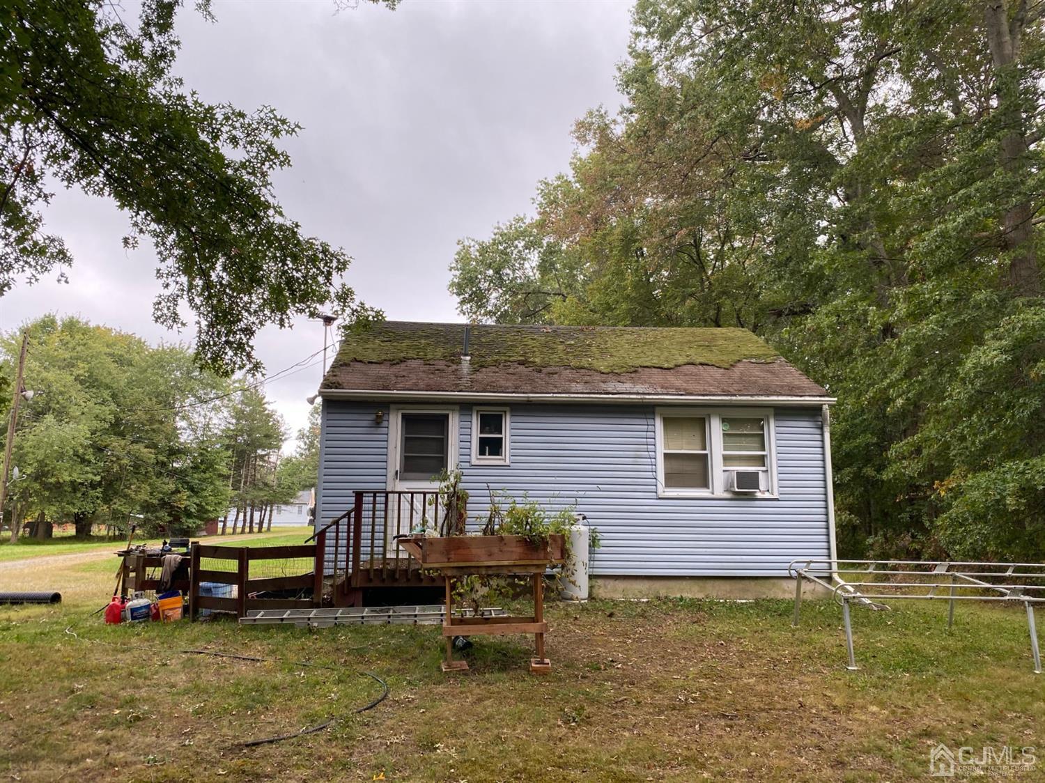 104 Oak Grove Road Flemington, NJ 08822 - Photo 25 of 25 a view of a house with a patio and a yard