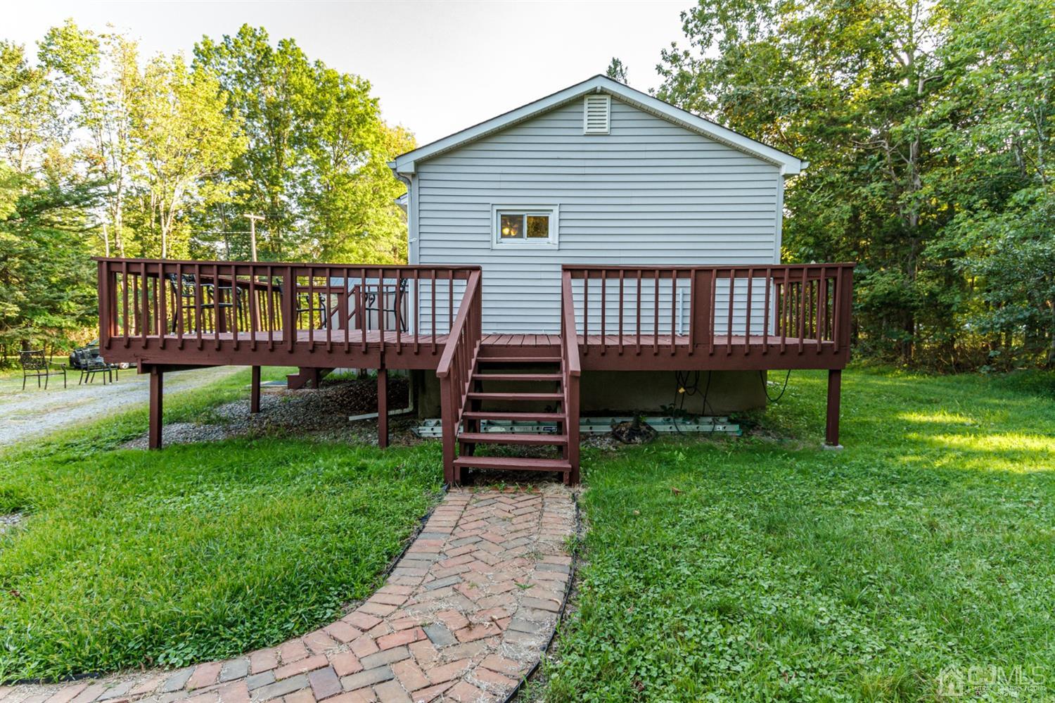 104 Oak Grove Road Flemington, NJ 08822 - Photo 10 of 25 a view of a house with a backyard