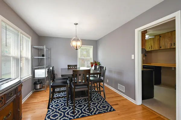 a view of a dining room with furniture