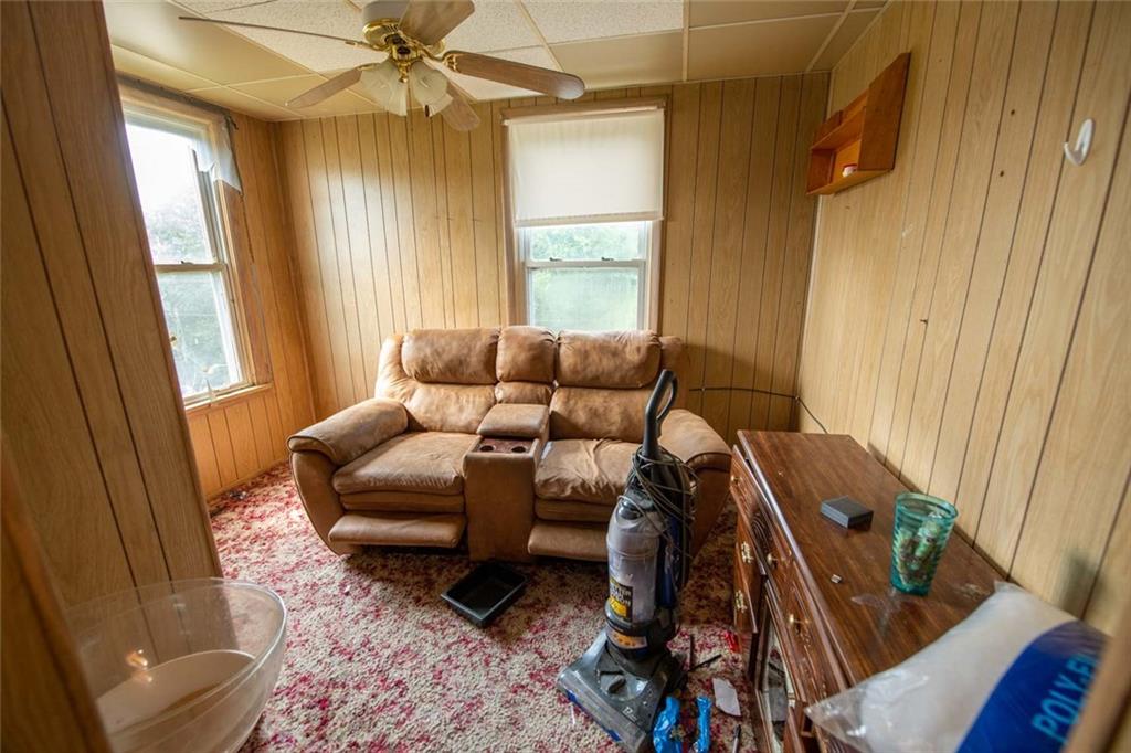 823 Lippencott Road Waynesburg, PA 15370 - Photo 16 of 25 a living room with furniture and a window
