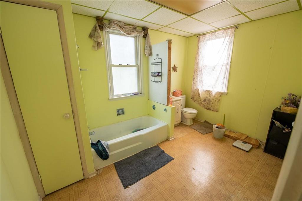 823 Lippencott Road Waynesburg, PA 15370 - Photo 20 of 25 a bathroom with a tub a sink and a shower
