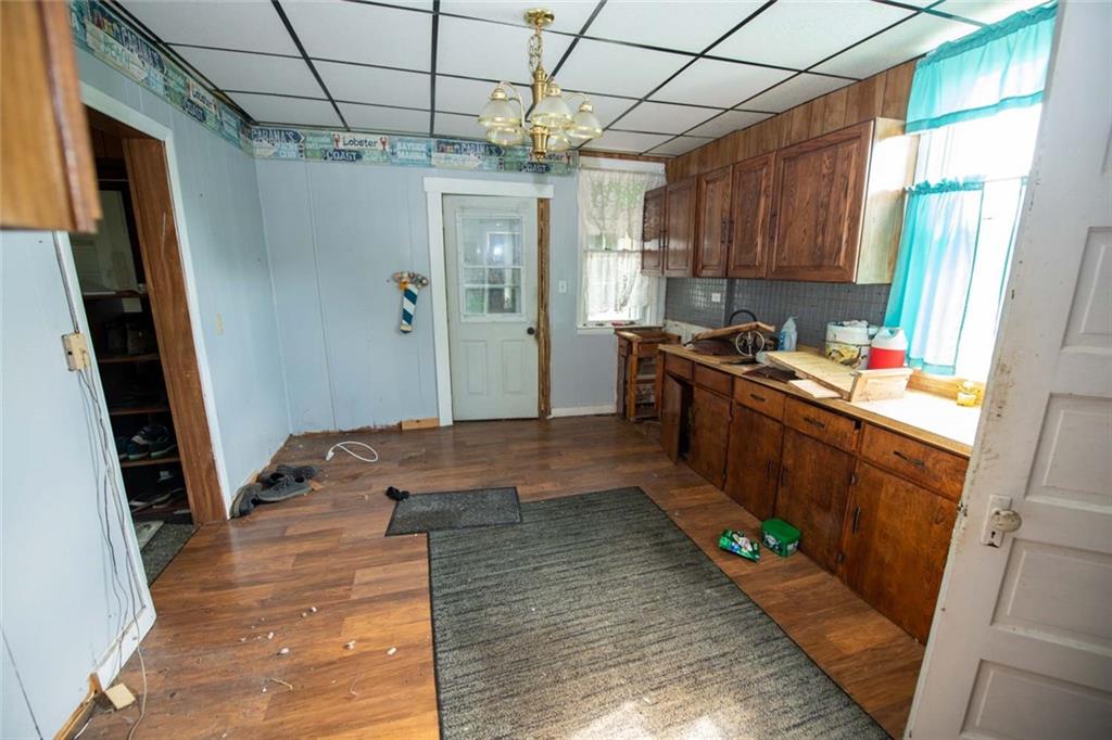 823 Lippencott Road Waynesburg, PA 15370 - Photo 3 of 25 a kitchen with stainless steel appliances granite countertop a refrigerator a stove top oven a sink and dishwasher
