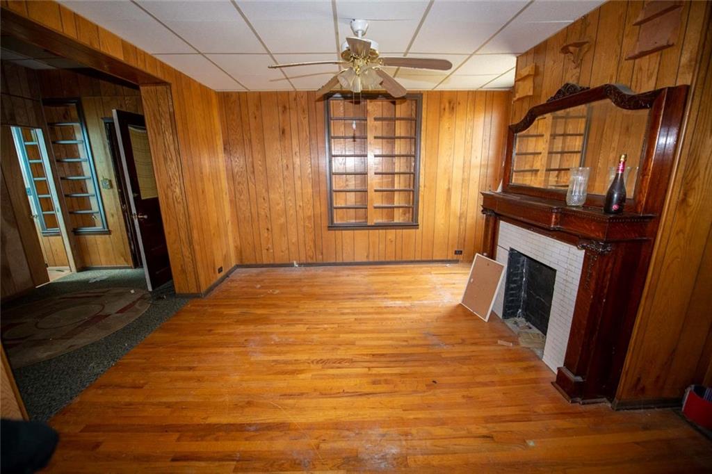 823 Lippencott Road Waynesburg, PA 15370 - Photo 8 of 25 a view of an empty room with a fireplace and a window