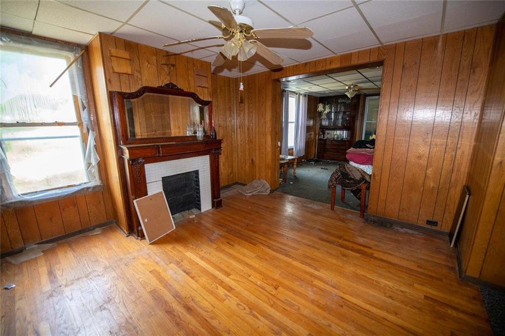 823 Lippencott Road Waynesburg, PA 15370 - Photo 9 of 25 a view of a livingroom with furniture and a fireplace