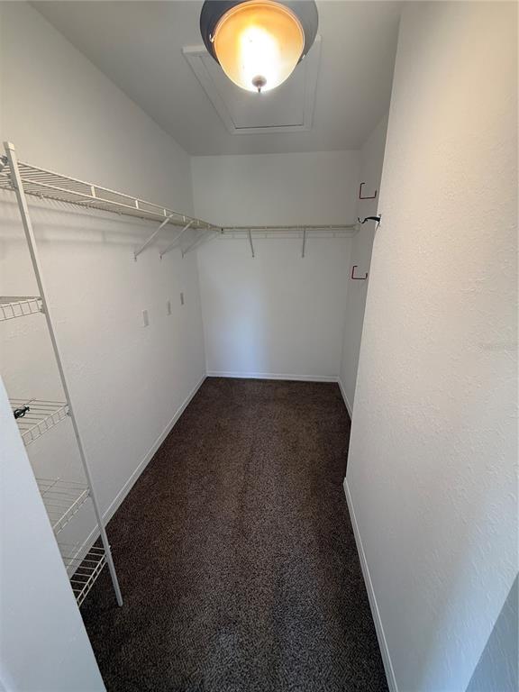 8932 Manor Loop, Unit 205 Lakewood Ranch, FL 34202 - Photo 11 of 15 wooden floor in an empty room