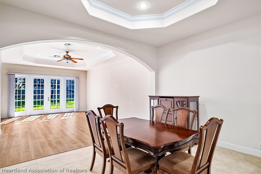 5224 Haw Branch Road Sebring, FL 33875 - Photo 2 of 40 a view of a dining room with furniture and window
