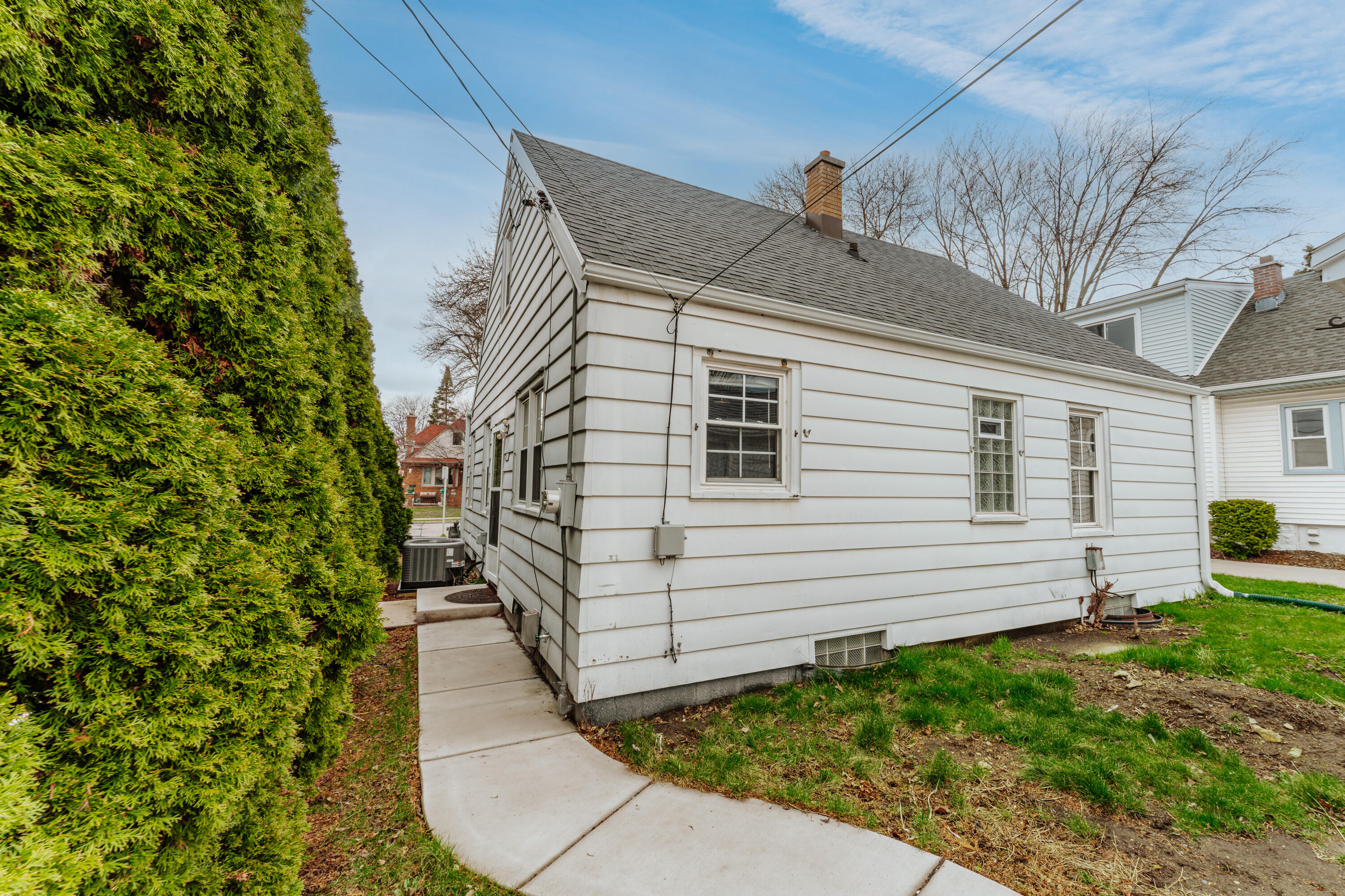 2320 North 68th Street Wauwatosa, WI 53213 - Photo 25 of 37 Walkway to Garage & Fenced Yard