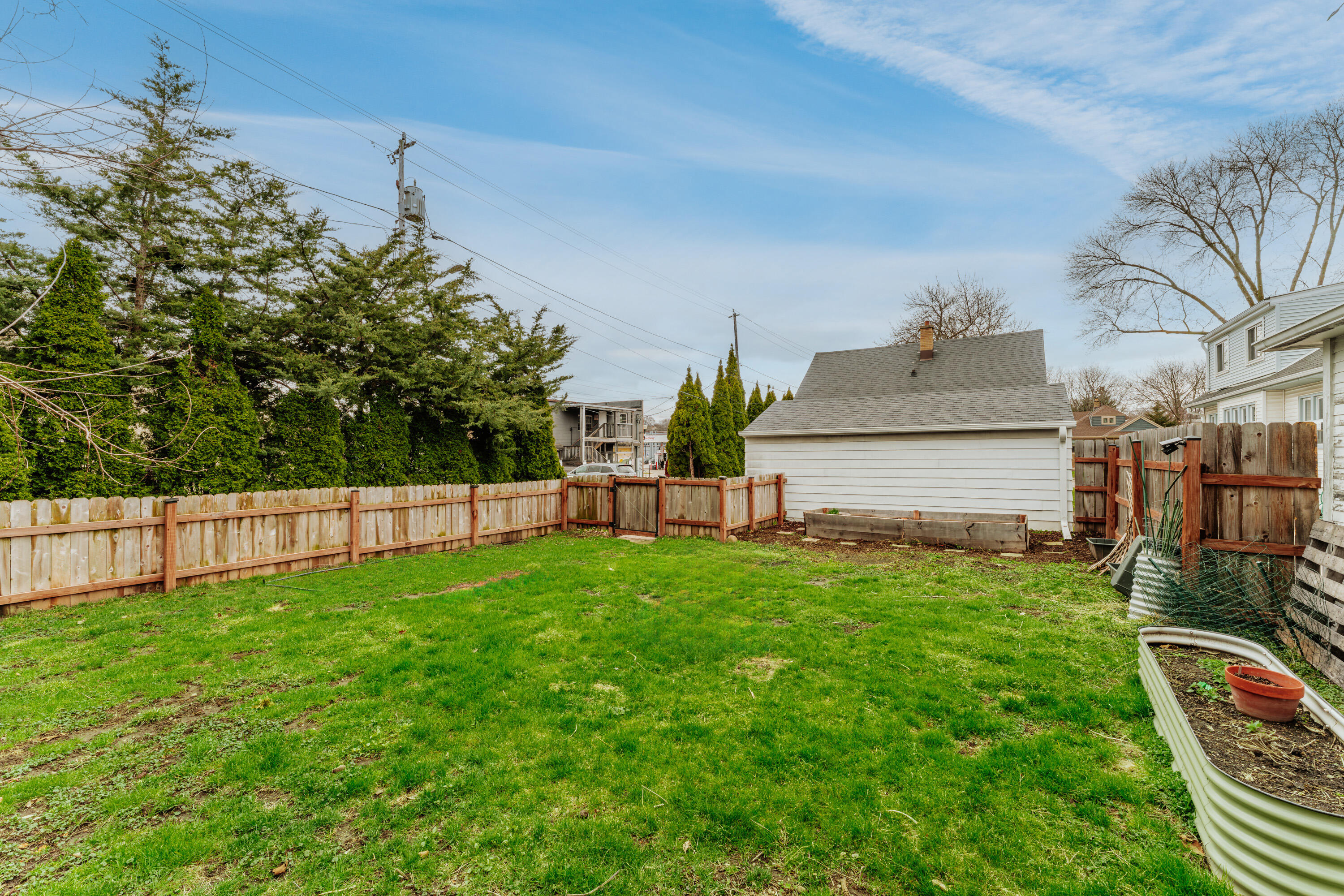 2320 North 68th Street Wauwatosa, WI 53213 - Photo 28 of 37 Backyard with Raised Garden Bed