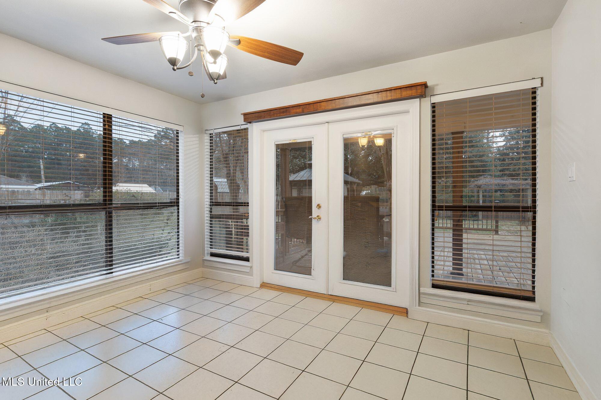 18029 Commission Road Long Beach, MS 39560 - Photo 12 of 34 Sunroom main floor