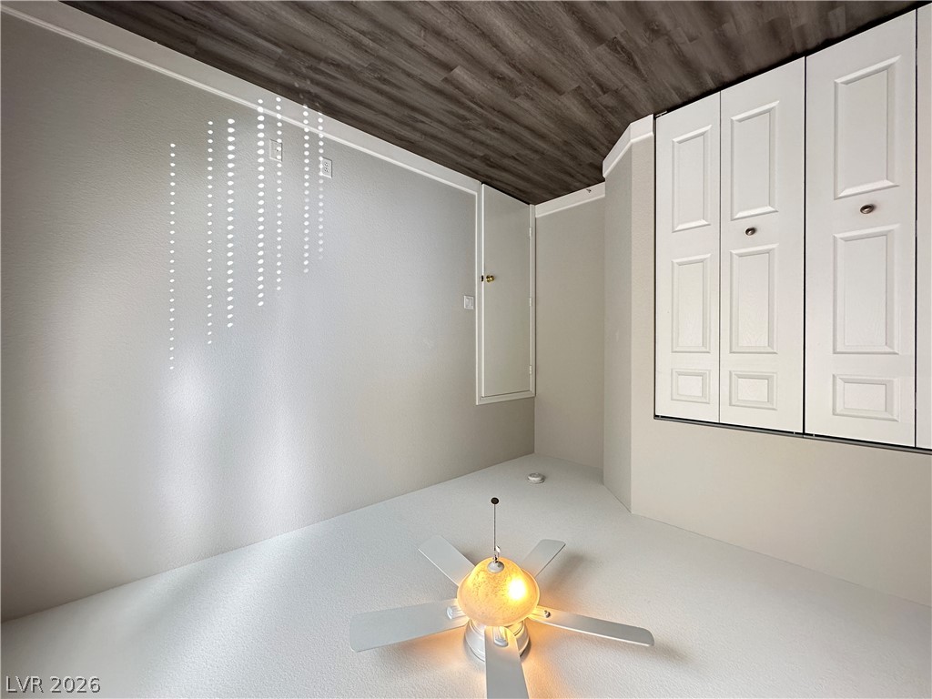 10191 Splendor Ridge Avenue Las Vegas, NV 89135 - Photo 9 of 31 A quiet space with a warm ceiling light and ample storage.