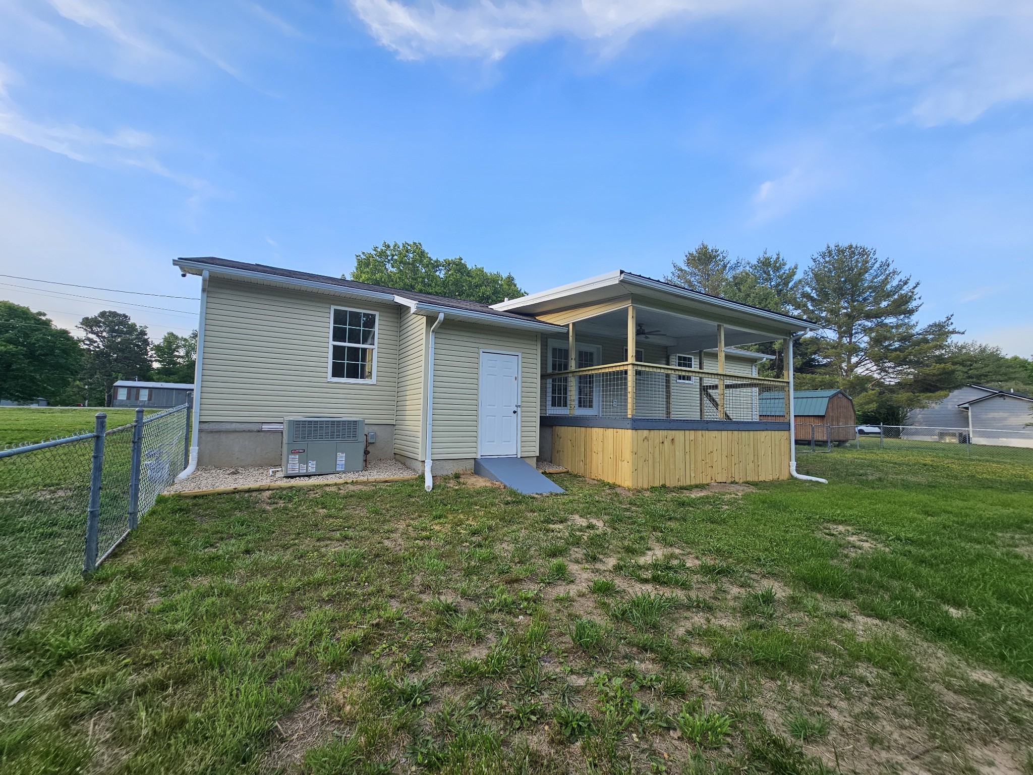 362 Forest Point Road Monteagle, TN 37356 - Photo 14 of 42 a view of a house with a yard