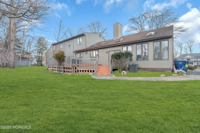 a view of a park with large trees