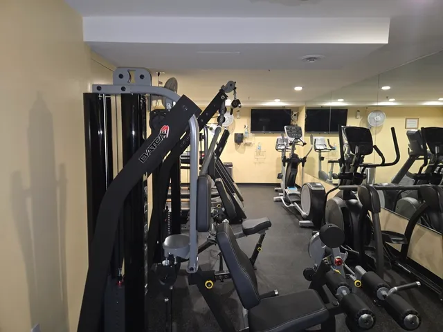 a lobby with furniture and rug