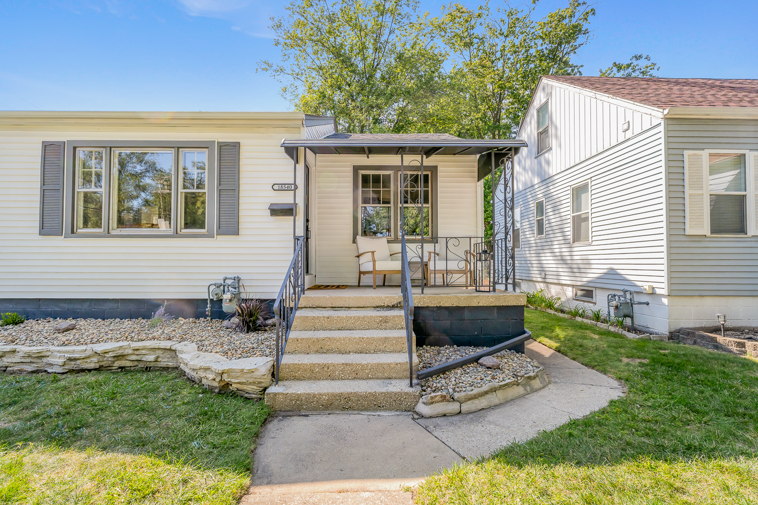 18540 Miller Drive Lansing, IL 60438 - Photo 3 of 57 a view of a house with backyard sitting area and garden