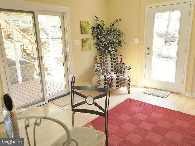 11611 Gail Street Silver Spring, MD 20902 - Photo 19 of 30 a very nice looking room with a large window and chandelier