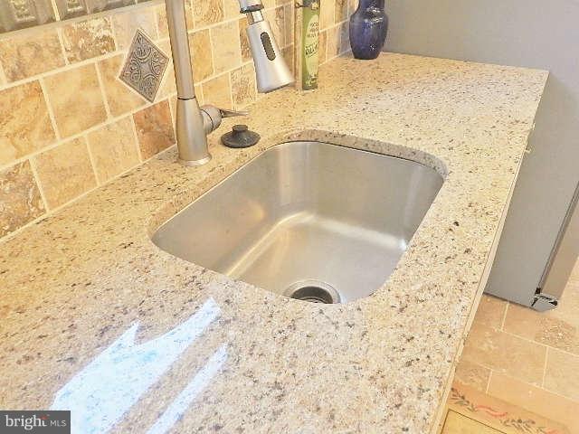 11611 Gail Street Silver Spring, MD 20902 - Photo 26 of 30 a bath tub sitting in a bathroom