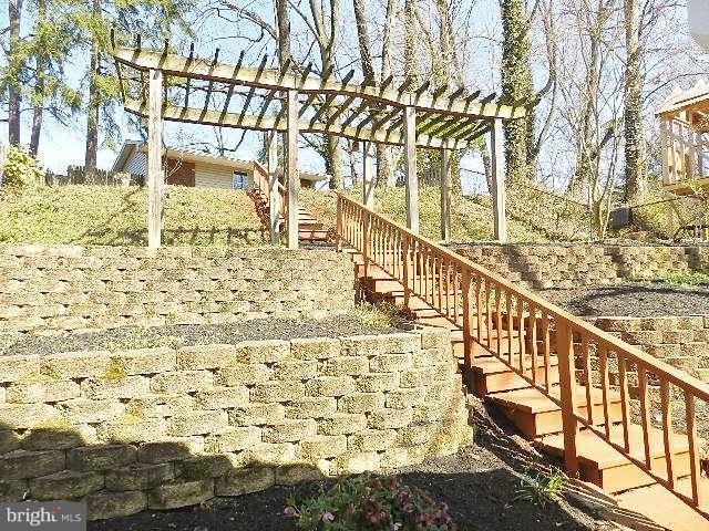 11611 Gail Street Silver Spring, MD 20902 - Photo 30 of 30 a view of a balcony with wooden floor and fence
