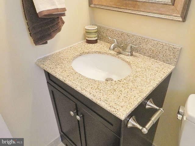 11611 Gail Street Silver Spring, MD 20902 - Photo 8 of 30 a bath tub sitting next to a sink