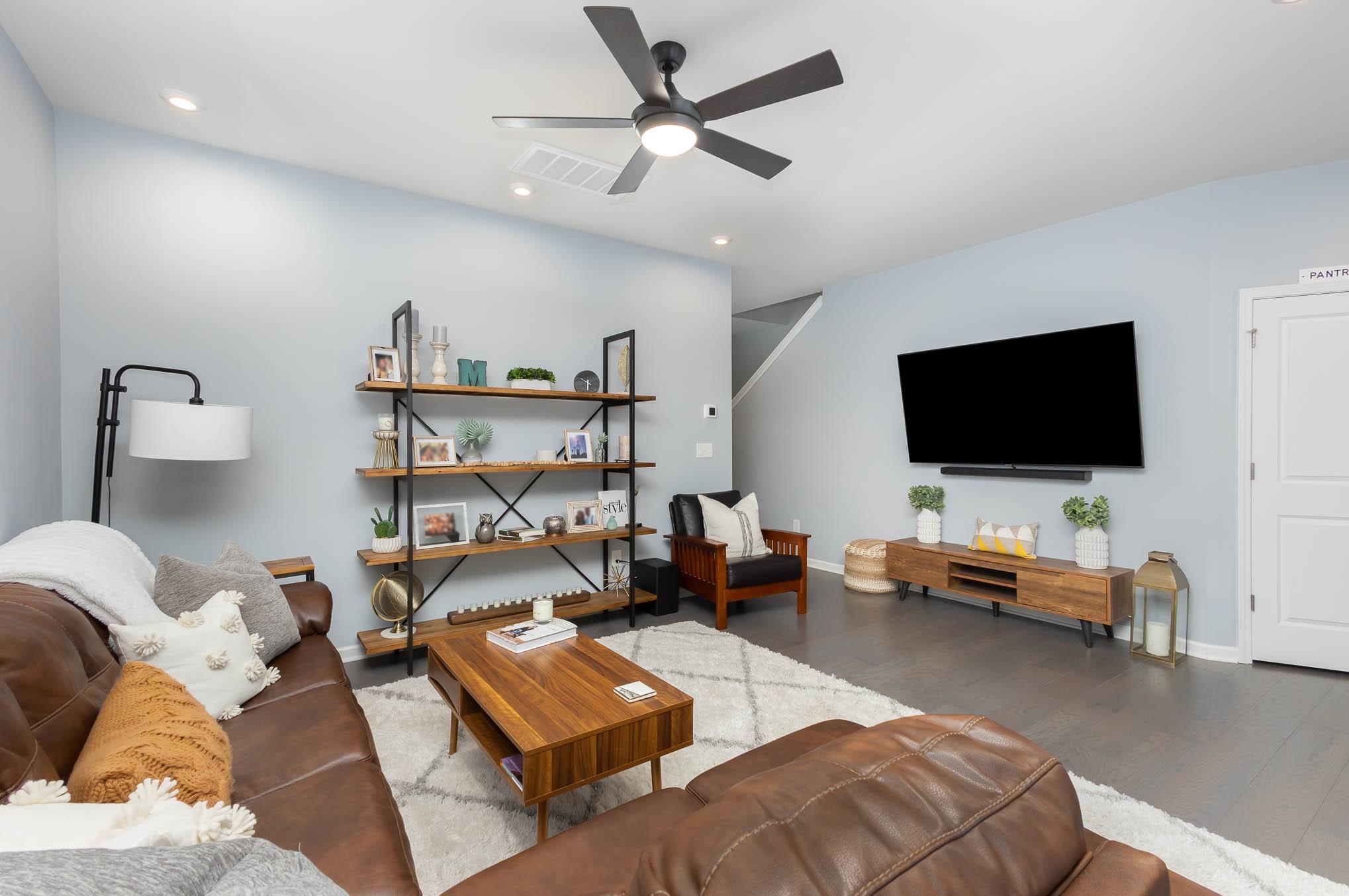 514 Madison Falls Fort Mill, SC 29708 - Photo 16 of 29 a living room with furniture and a flat screen tv