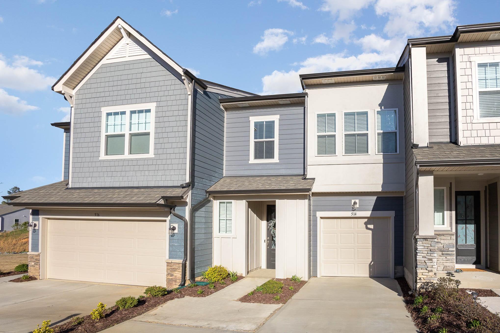 514 Madison Falls Fort Mill, SC 29708 - Photo 2 of 29 a front view of a house with a yard and balcony