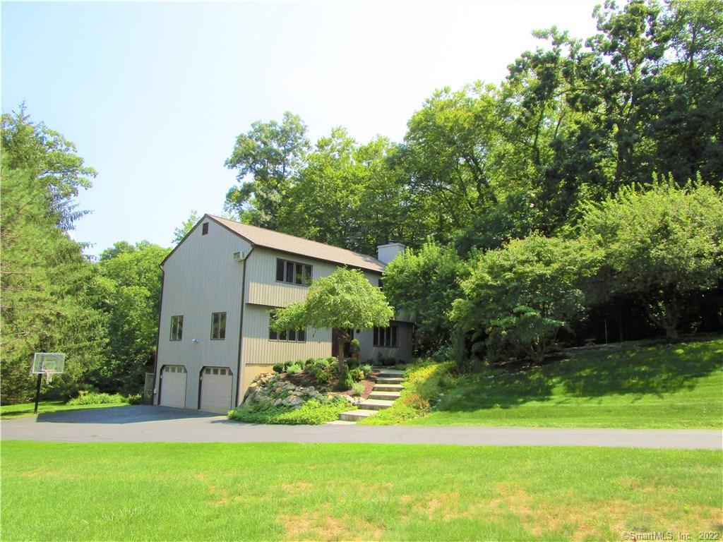 51 Pheasant Drive Ridgefield, CT 06877 - Photo 1 of 1 Beautiful home surrounded by woods, yard and gardens.