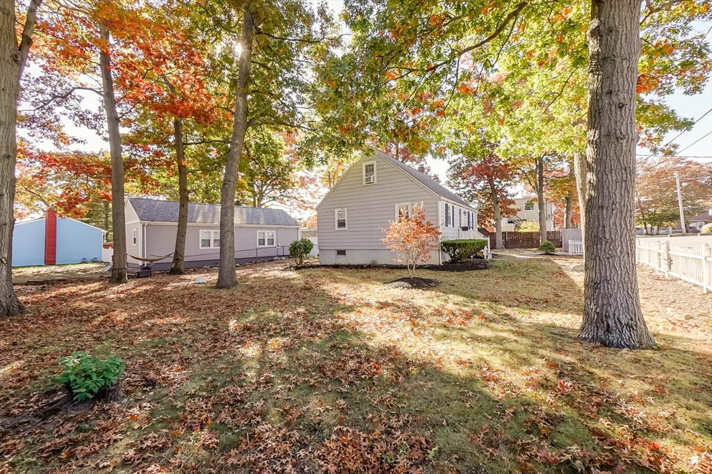 5 Oliver Street Randolph, MA 02368 - Photo 8 of 29 a view of a barn in the middle of a yard