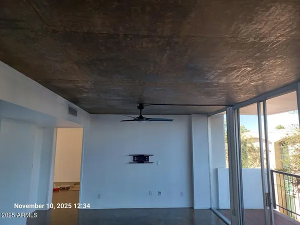 a view of a balcony with city view