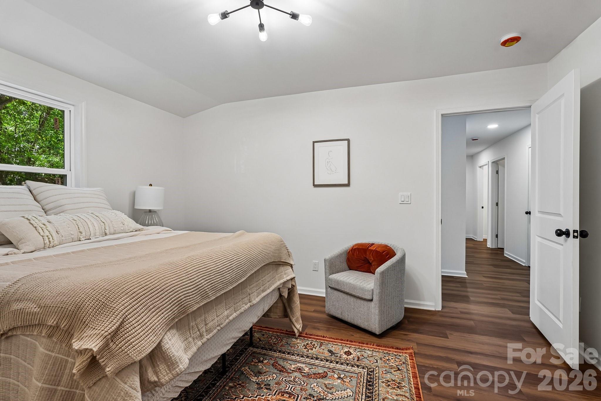 514 West Arch Street Lancaster, SC 29720 - Photo 20 of 43 a bedroom with a bed and window