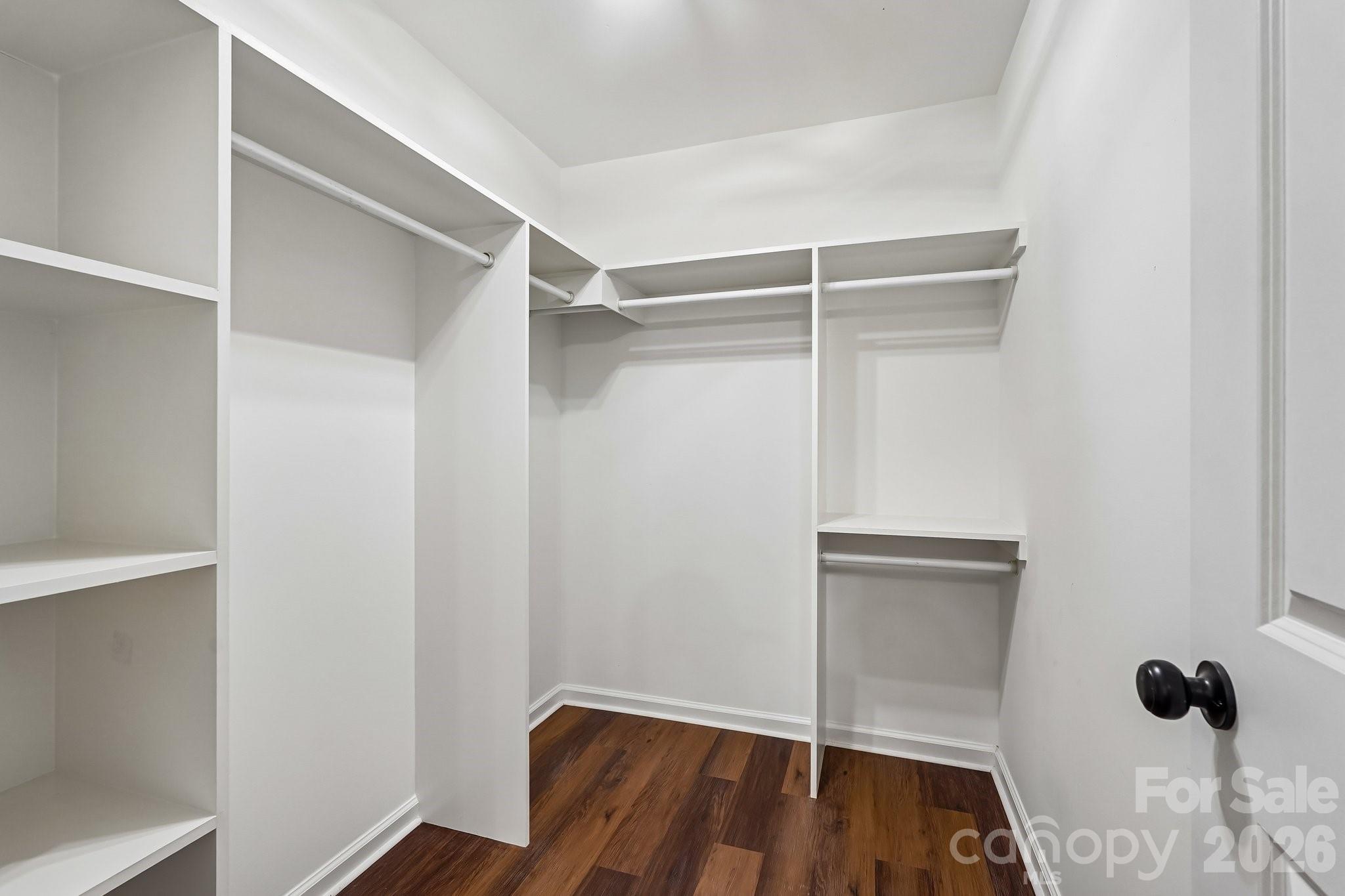 514 West Arch Street Lancaster, SC 29720 - Photo 21 of 43 a view of walk in closet with empty racks