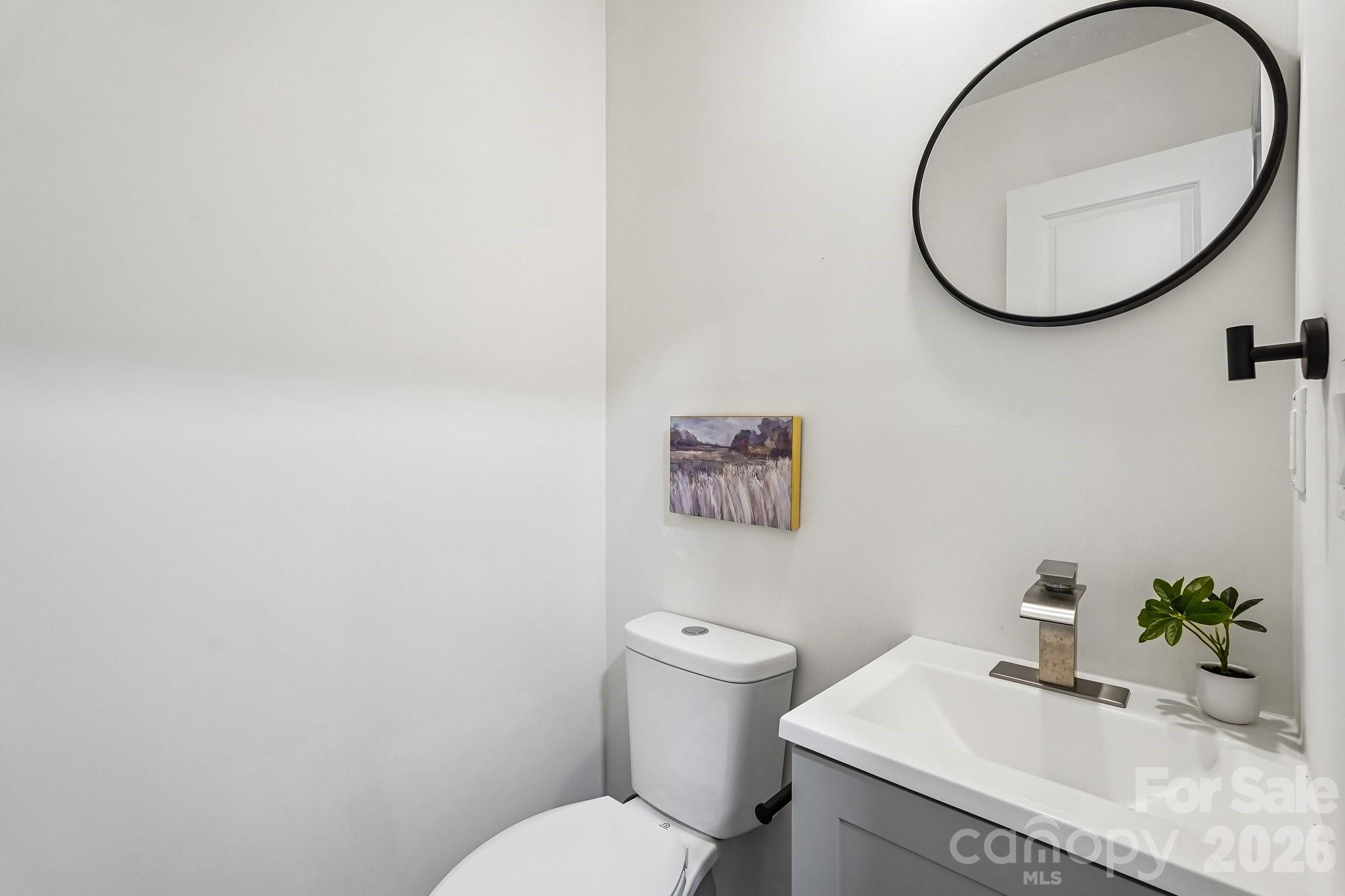 514 West Arch Street Lancaster, SC 29720 - Photo 23 of 43 a bathroom with a toilet and a sink