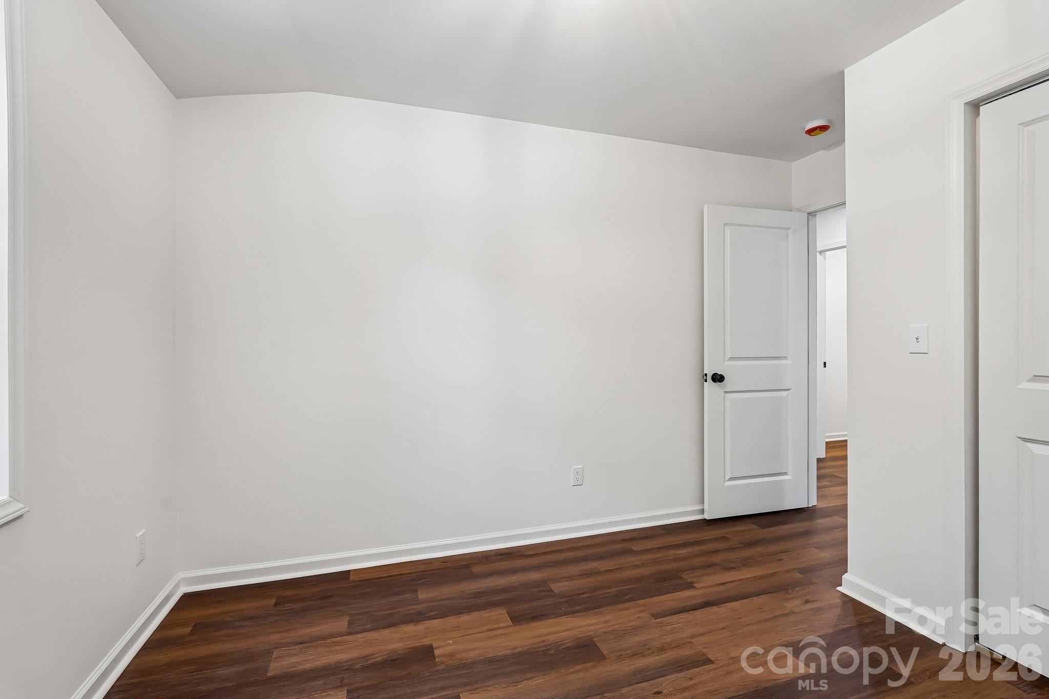 514 West Arch Street Lancaster, SC 29720 - Photo 26 of 43 a view of room with wooden floor